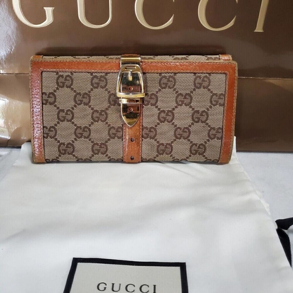 Gucci GG Logo Continental Canvas Tan Bifold Wallet with Leather Trim. 1462012778